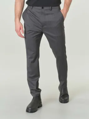 Pantaloni grigi in tela di lana con fantasia spinata a righe
